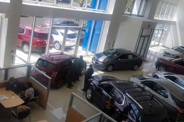 Bical Auto Mall Chevrolet in Brooklyn NY Dealership Building Interior with new vehicles